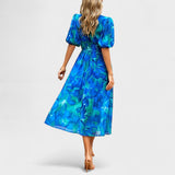 Clara | Eleganta ziedu midi kleita